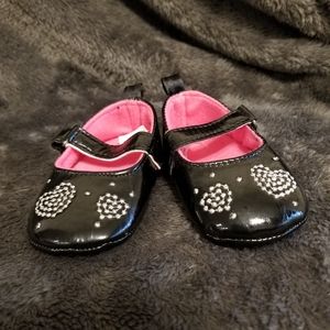 Baby size 2 black flats with heart shape design